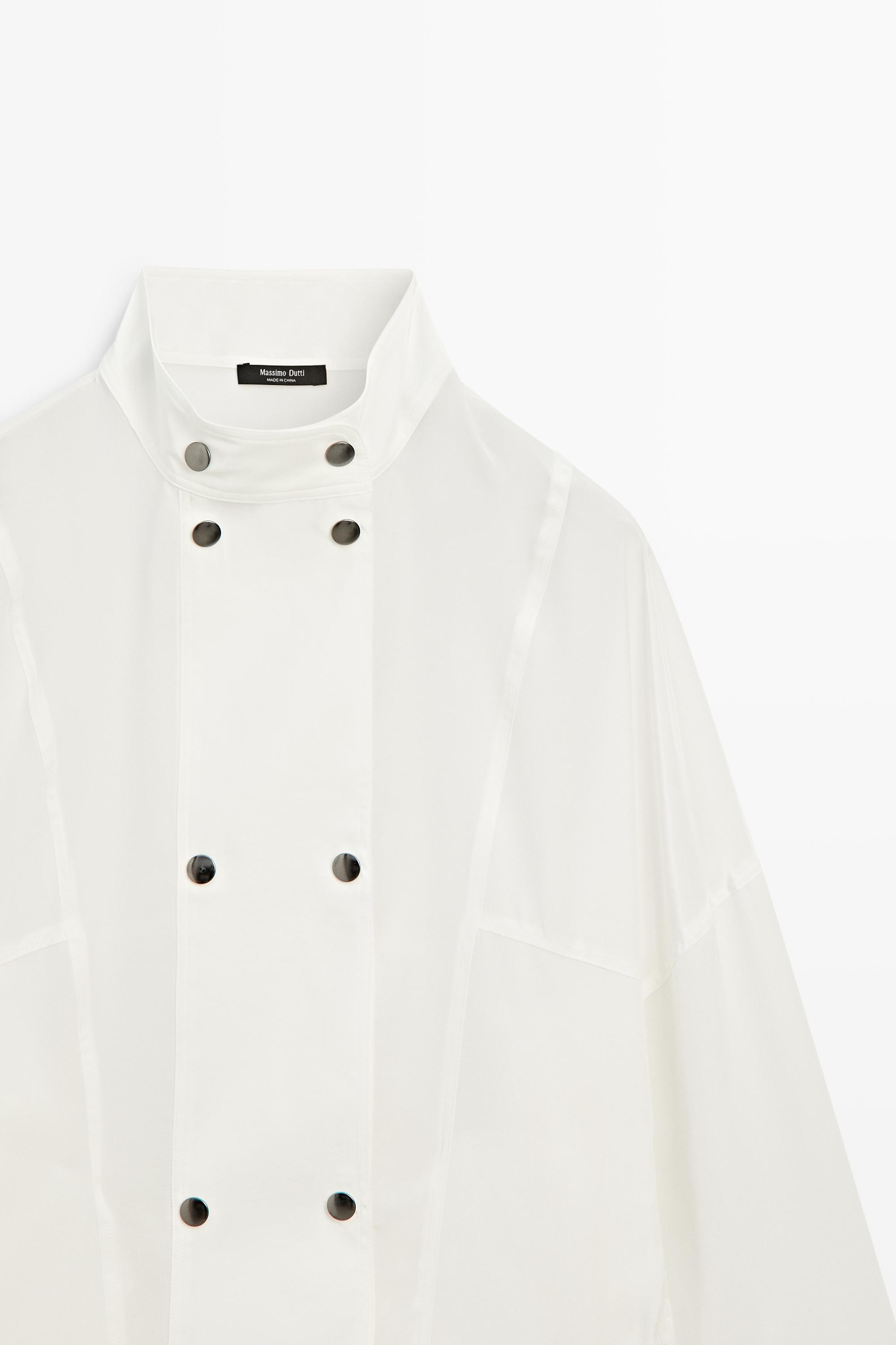Chemise à col officier et fermeture pression